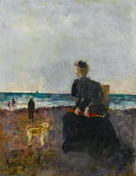 Femme assise sur la plage